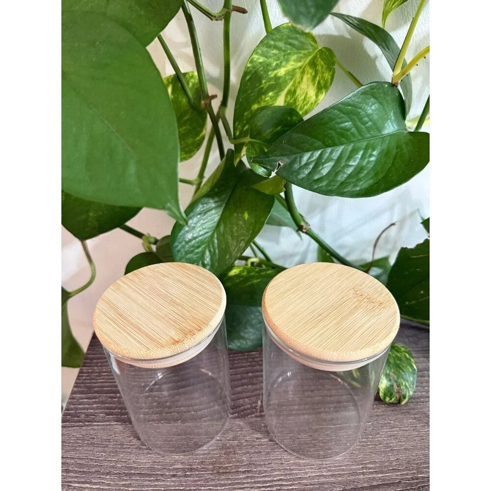Two wooden sealed jars